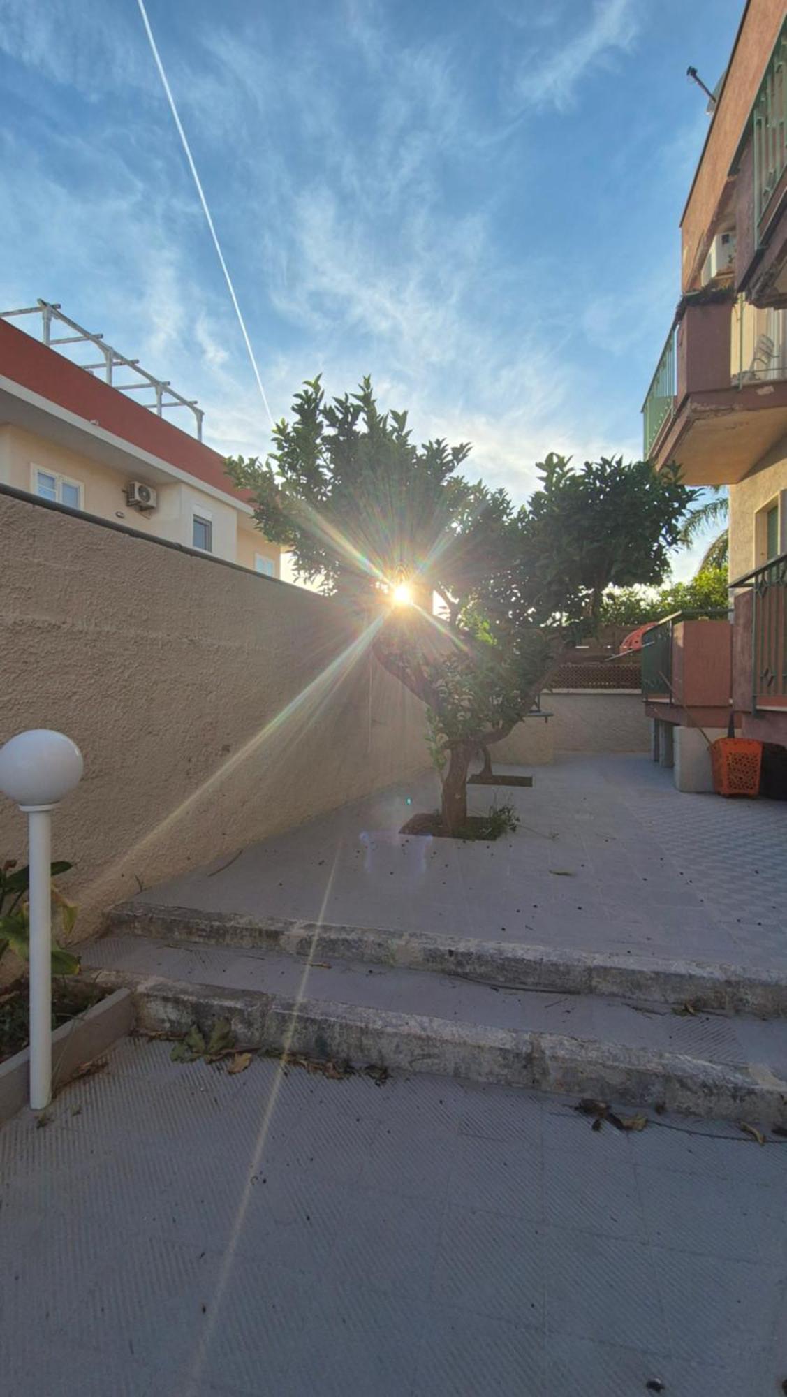 Camera Familiare con Vista Giardino
